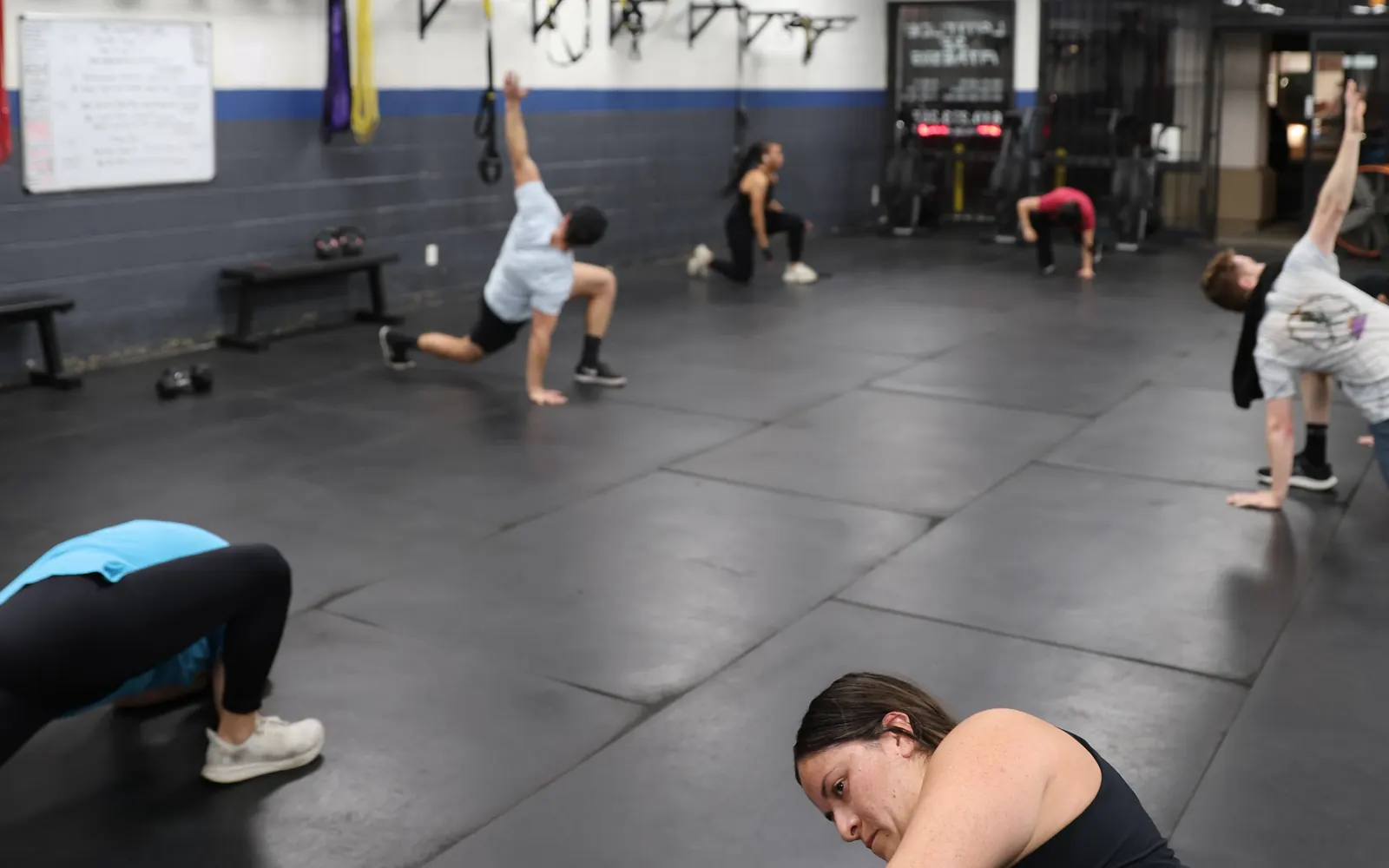 Group class warming up at Latitude 32 Fitness